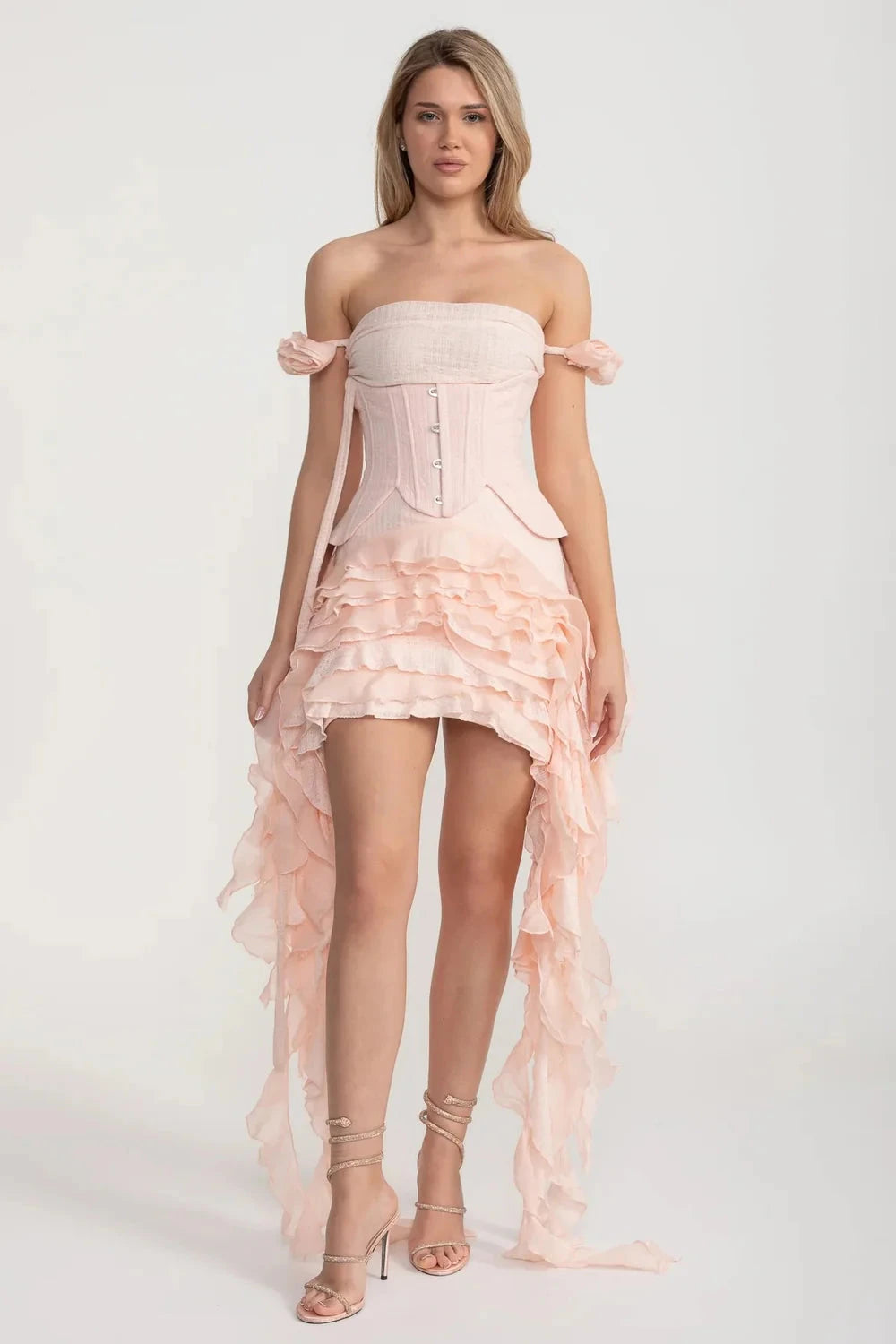 Vintage Inspired Corset Dress With Ruched Bustier And Flowing Ruffled Side Details - Pink