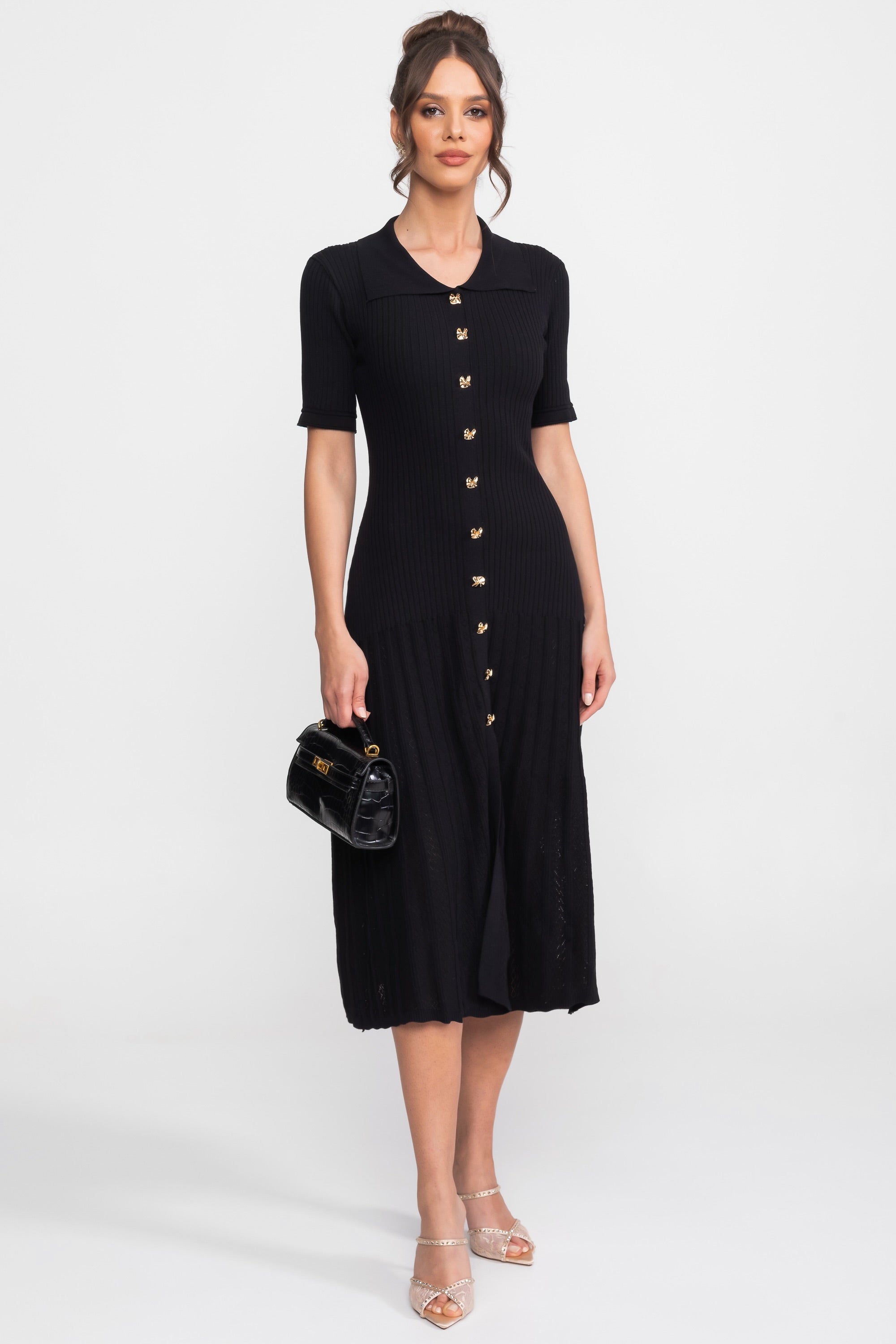 Abito midi in maglia a coste con colletto Peter Pan e gonna plissettata - Nero