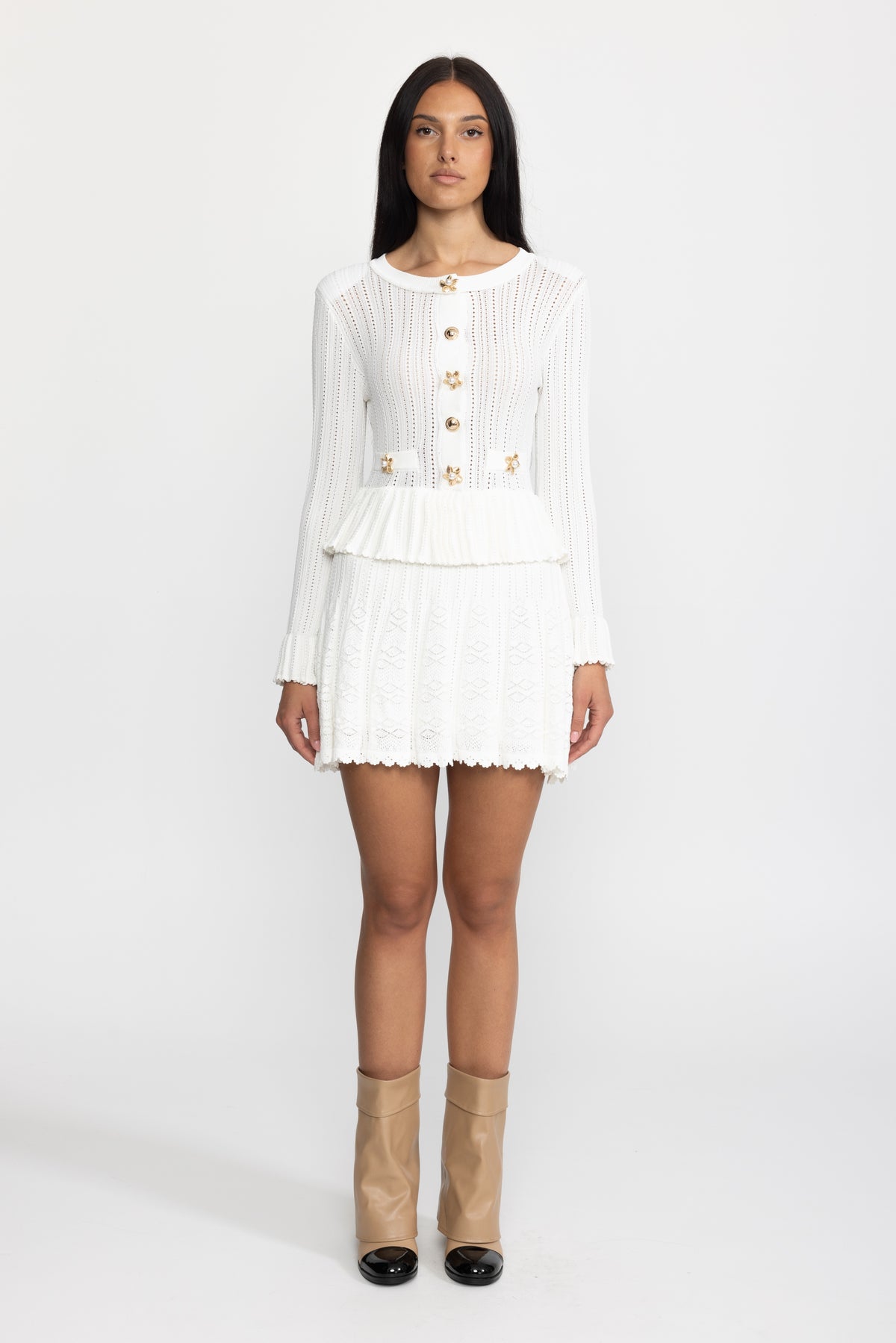 Mini abito peplum in maglia pointelle con bottoni a fiore - Bianco