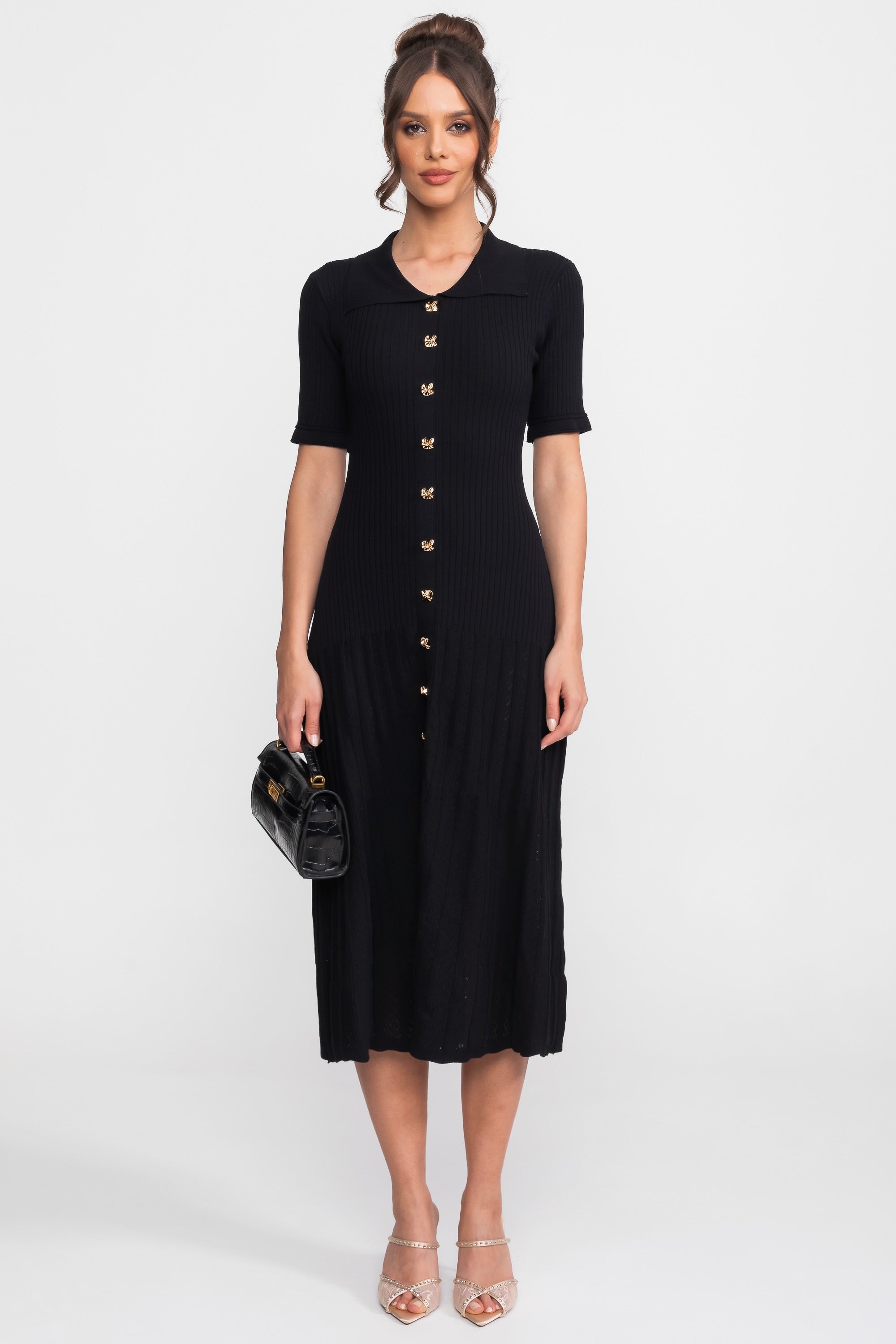 Abito midi in maglia a coste con colletto Peter Pan e gonna plissettata - Nero
