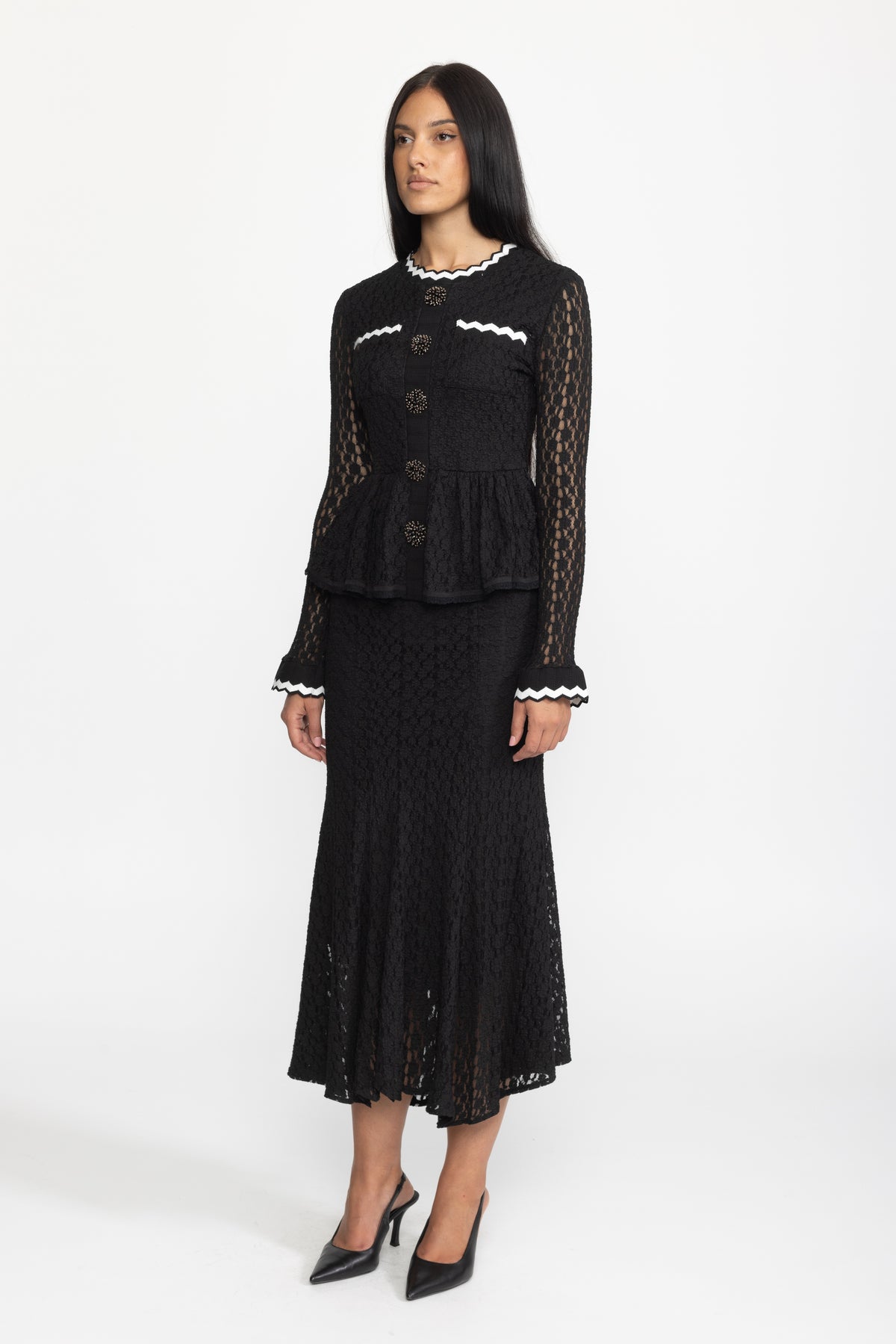 Abito midi in maglia crochet con peplo e finiture ric-rac - Nero