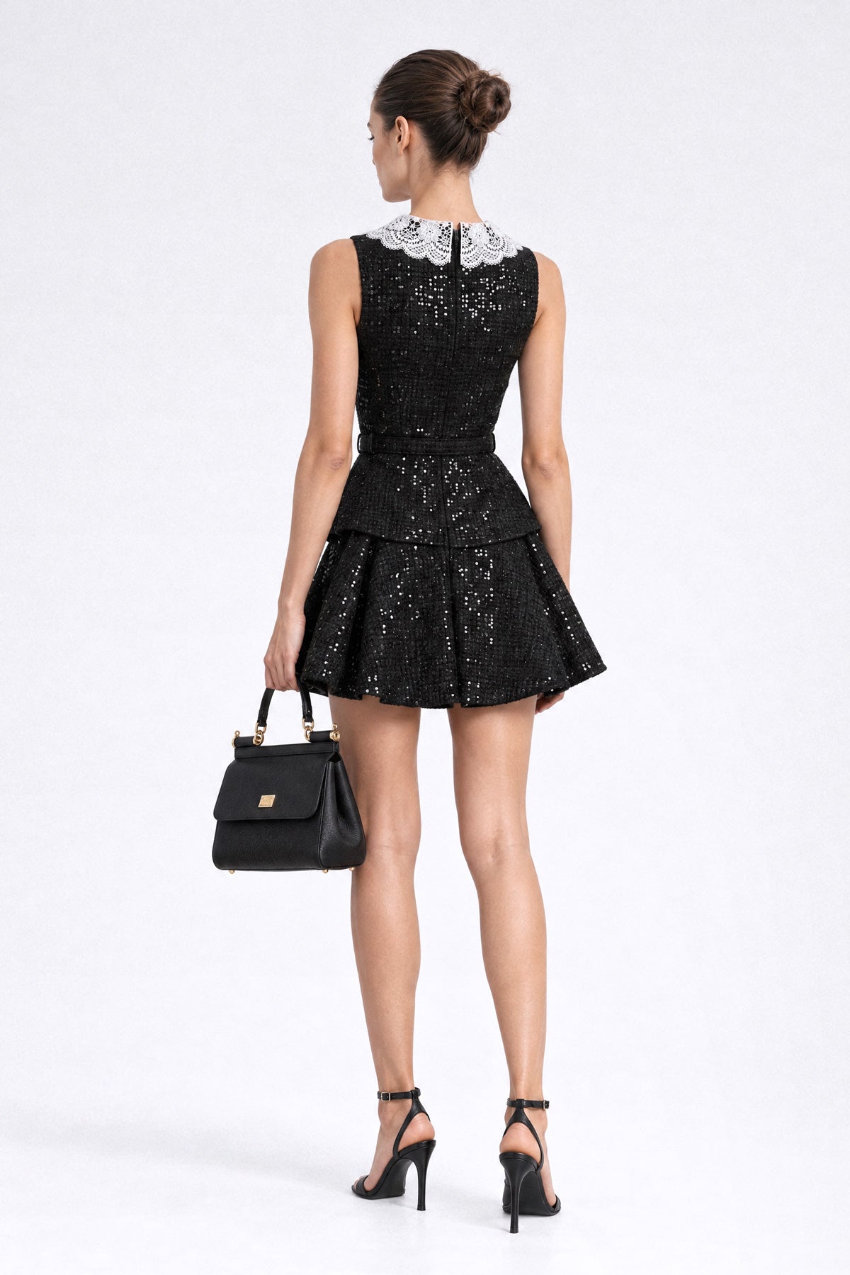 Mini abito peplum in tweed con paillettes - Nero