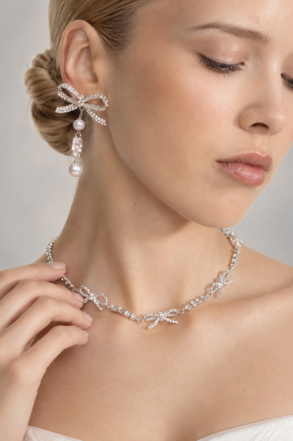 Set collana con fiocco di cristallo e orecchini pendenti con perle - Argento