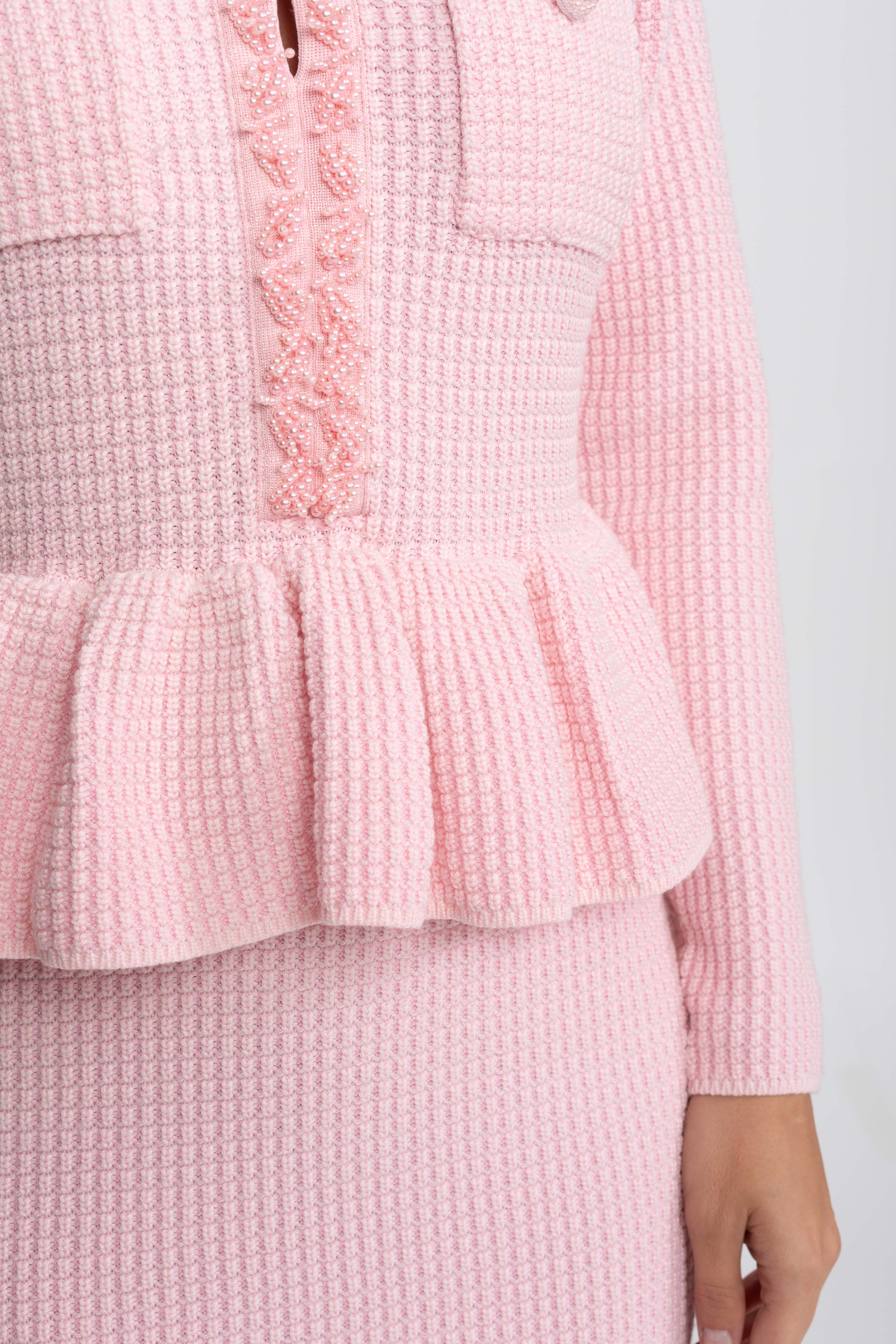 Abito Peplum in Maglia con Rifiniture Frangiate e Tasche Frontali sul Petto - Rosa