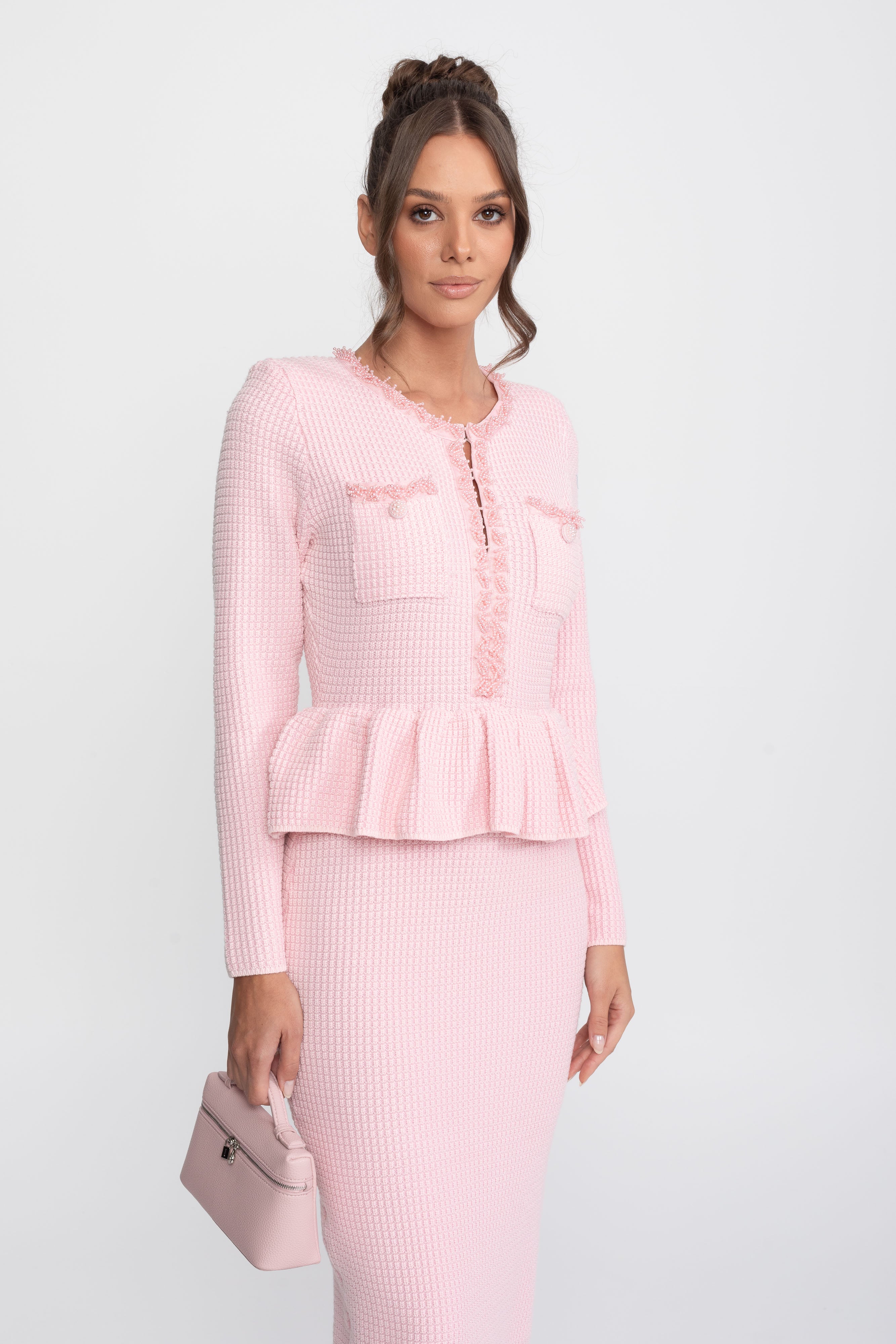 Abito Peplum in Maglia con Rifiniture Frangiate e Tasche Frontali sul Petto - Rosa