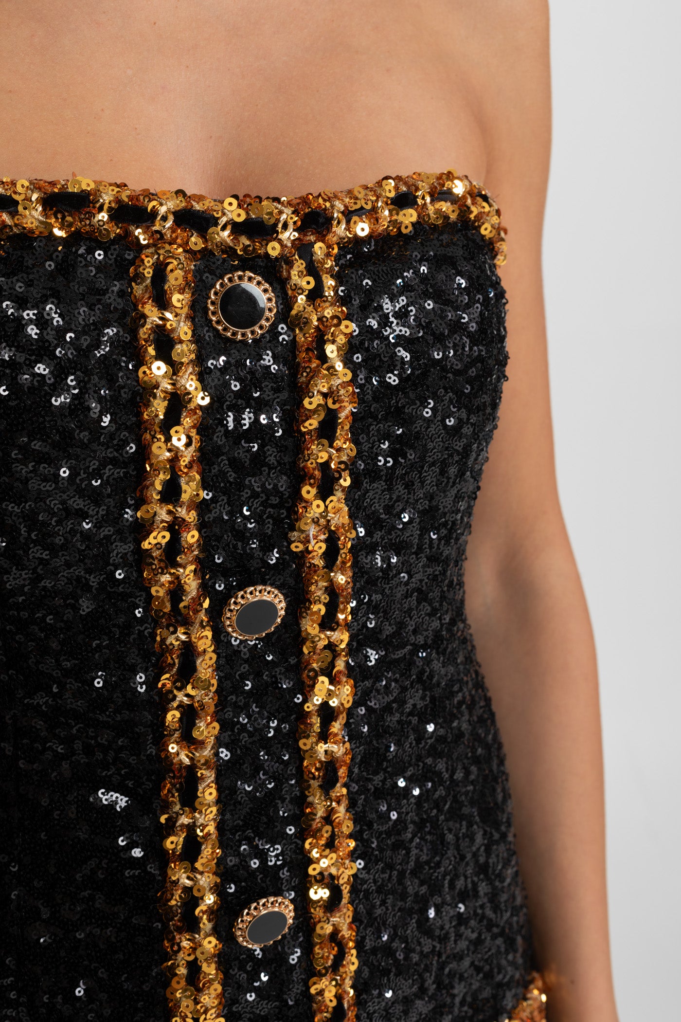 Mini abito senza spalline in paillettes con dettagli in catena – Nero