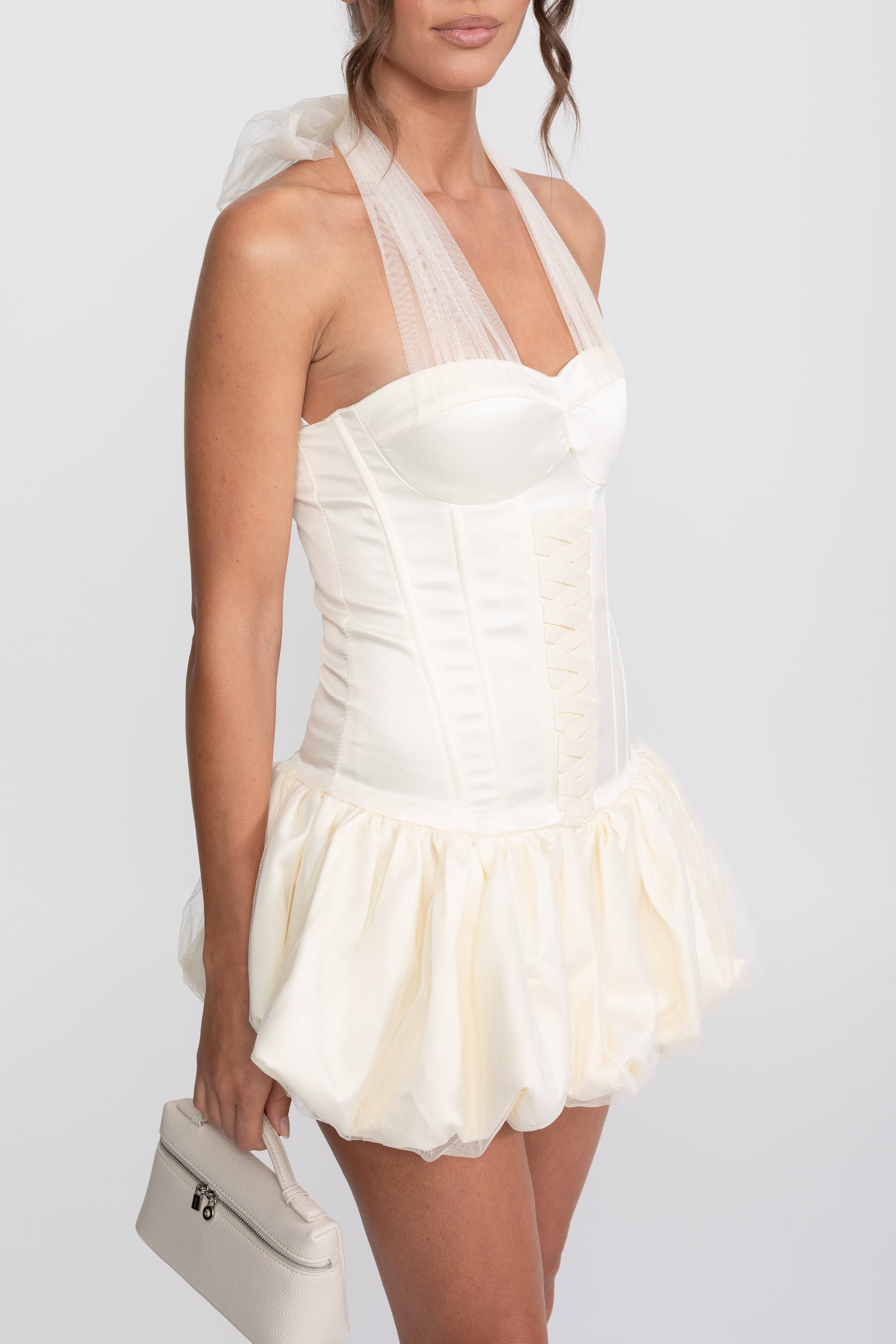 Mini abito Corset Bubble Hem con halter trasparente da annodare - Ivoire