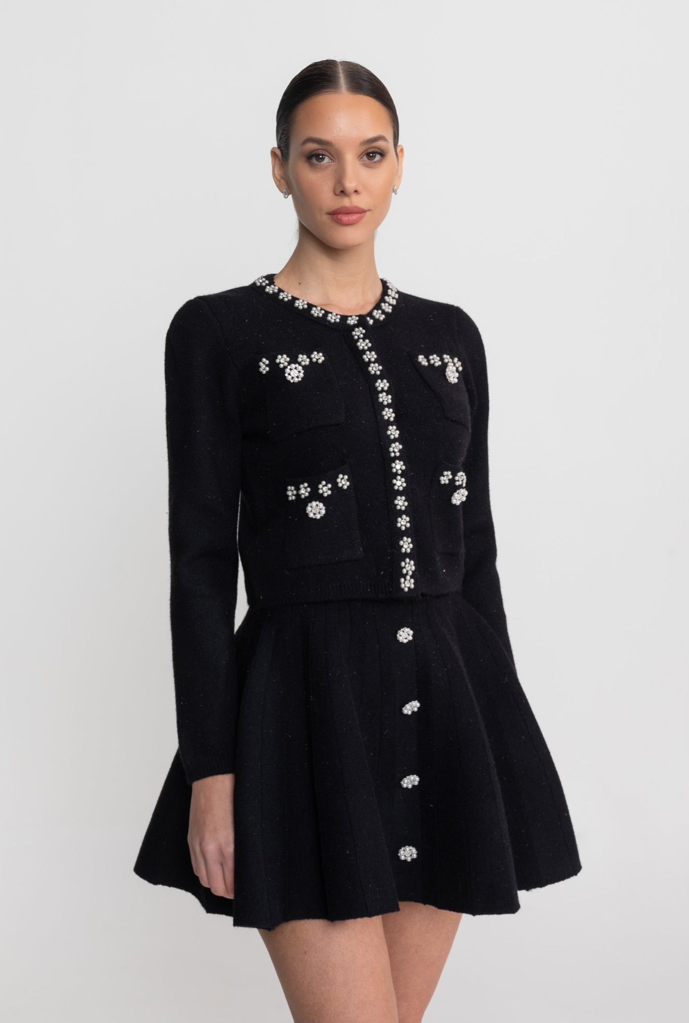 Set Coordinato in Maglia con Cardigan a Maniche Lunghe e Minigonna Coordinata - Nero 