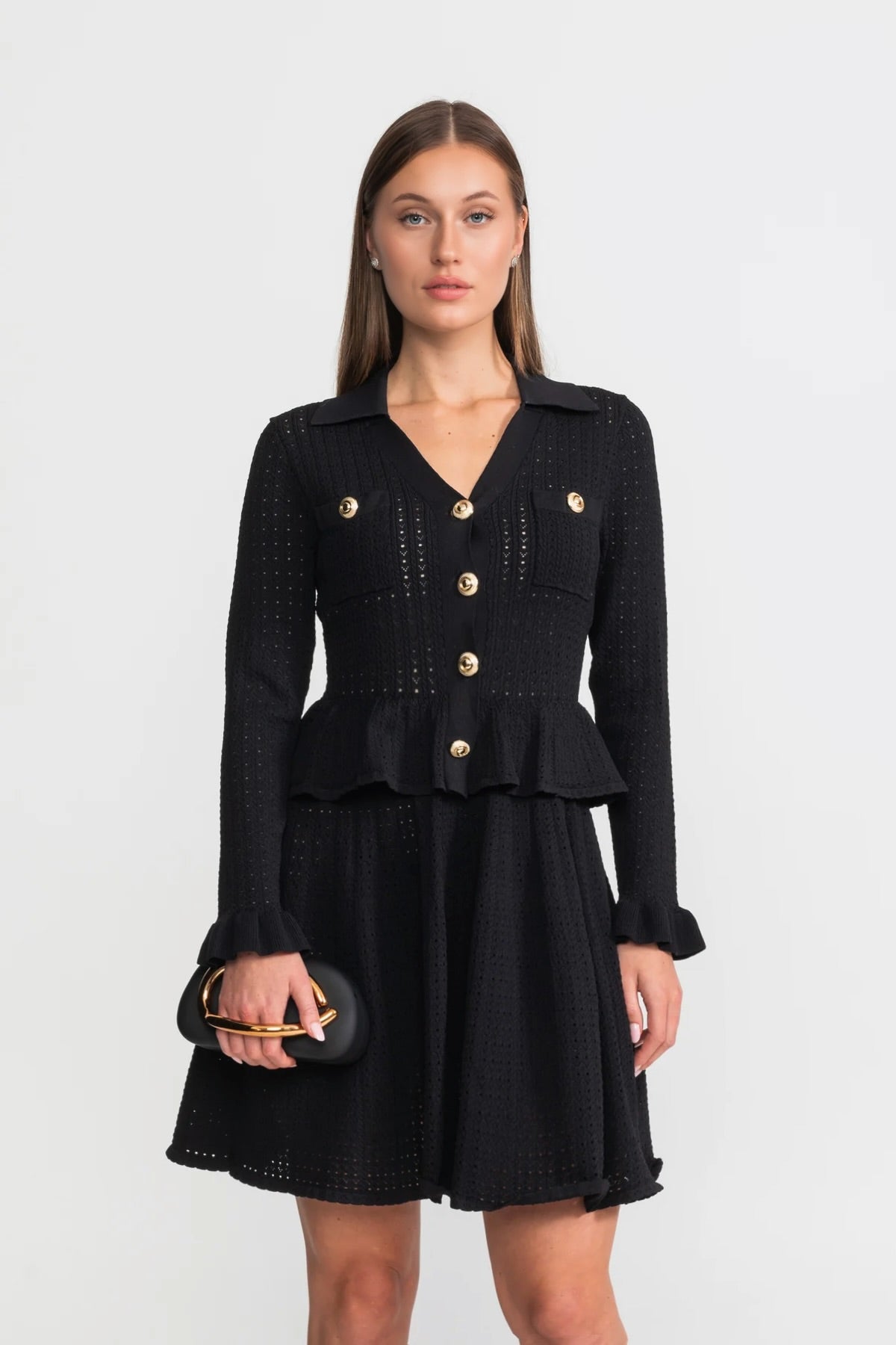 Abito mini in maglia con vita peplum e dettagli di bottoni dorati - Nero 