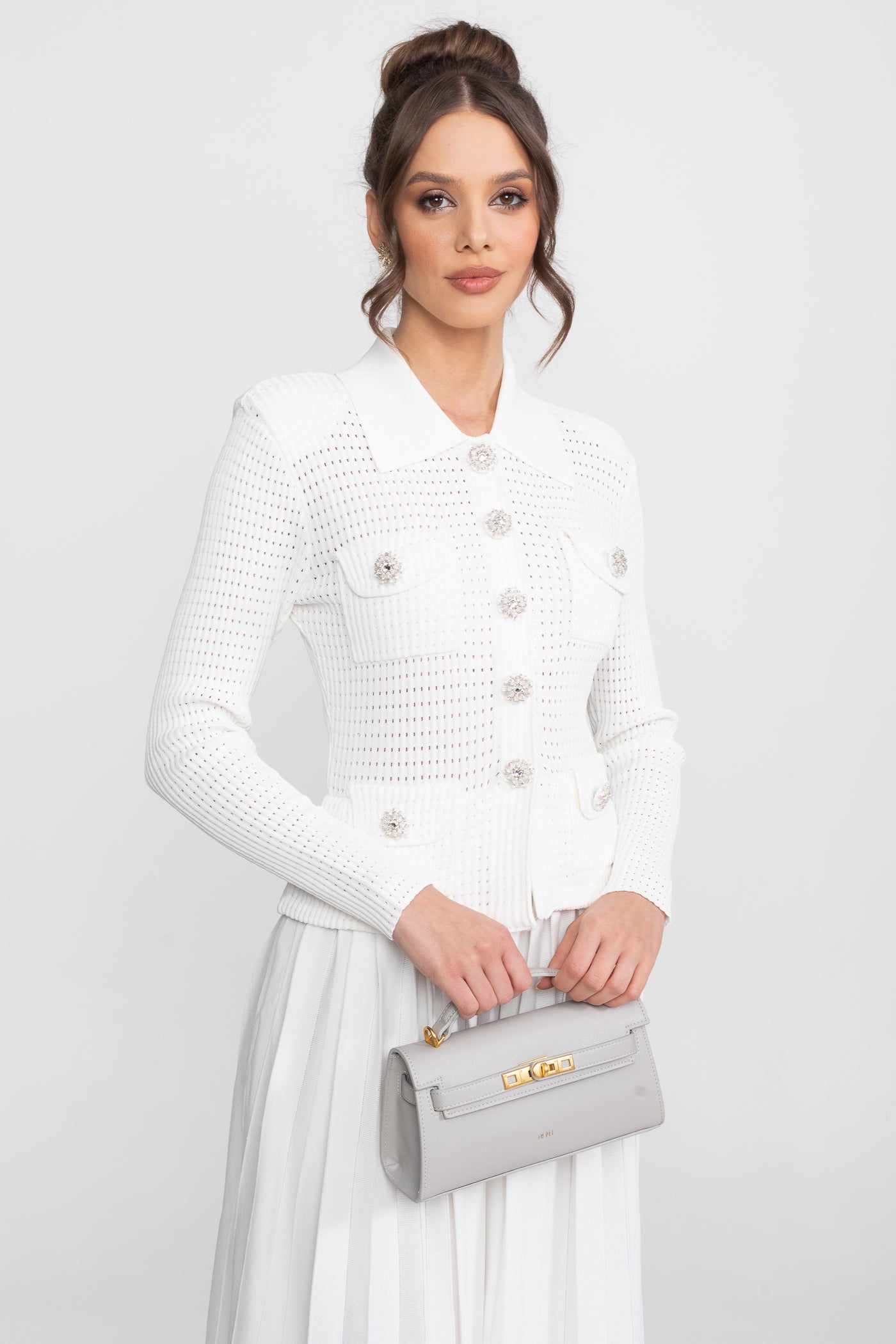 Completo coordinato con cardigan a maglia traforata e gonna midi plissettata - Bianco 