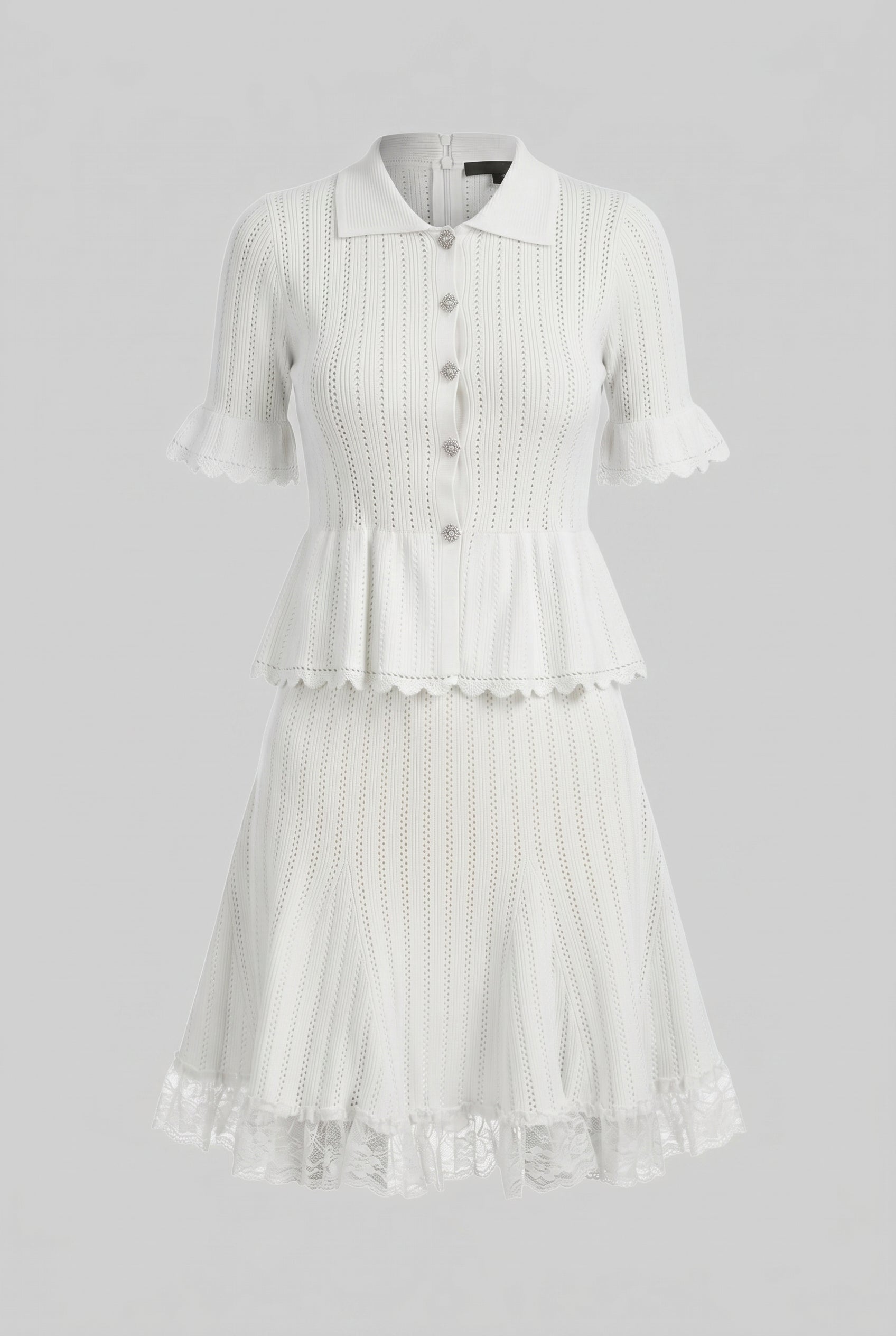 Mini abito peplum in maglia con colletto Peter Pan e orlo in pizzo - Bianco 