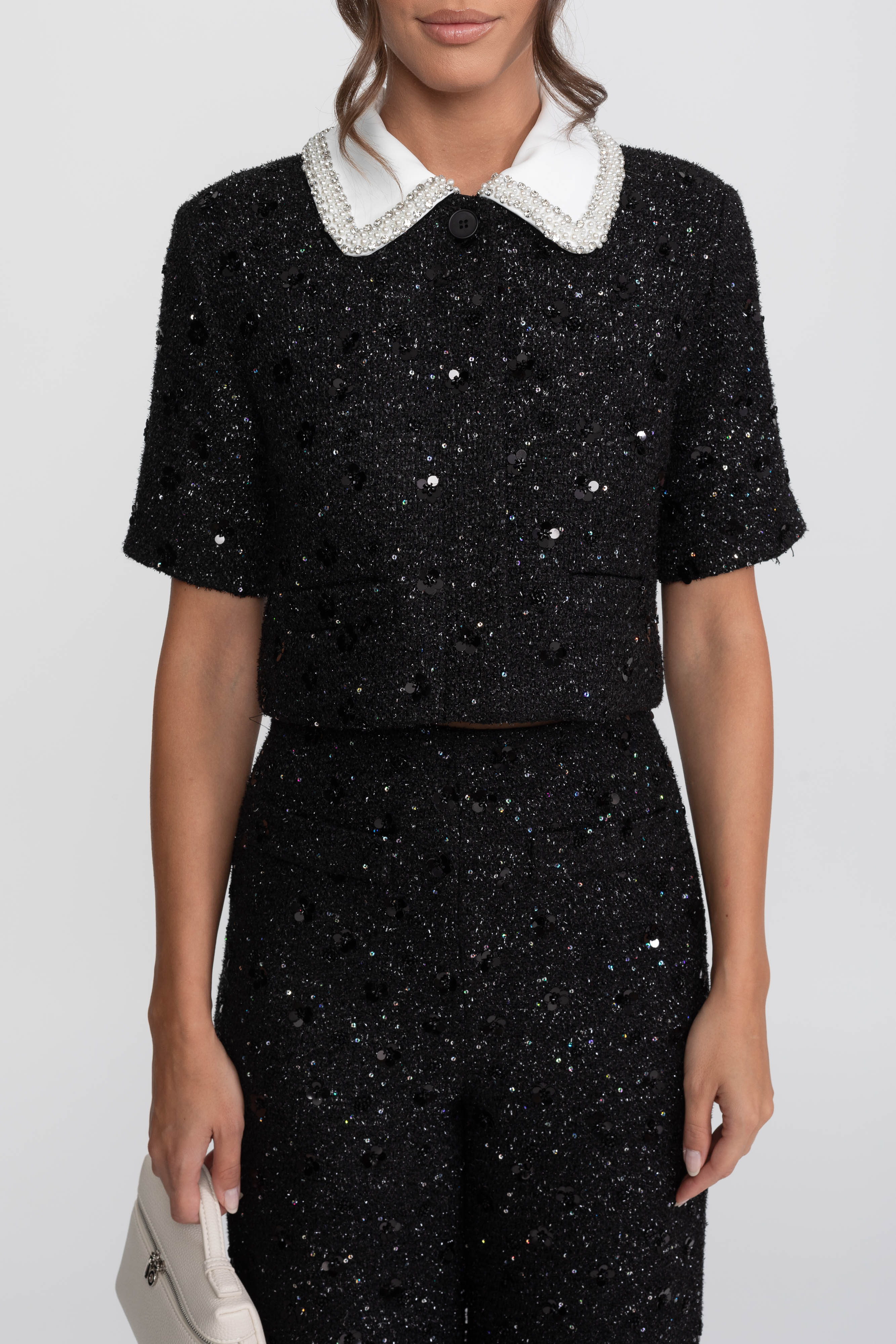 Giacca cropped in tweed a maniche corte con colletto a contrasto e dettaglio di paillettes - Nero 