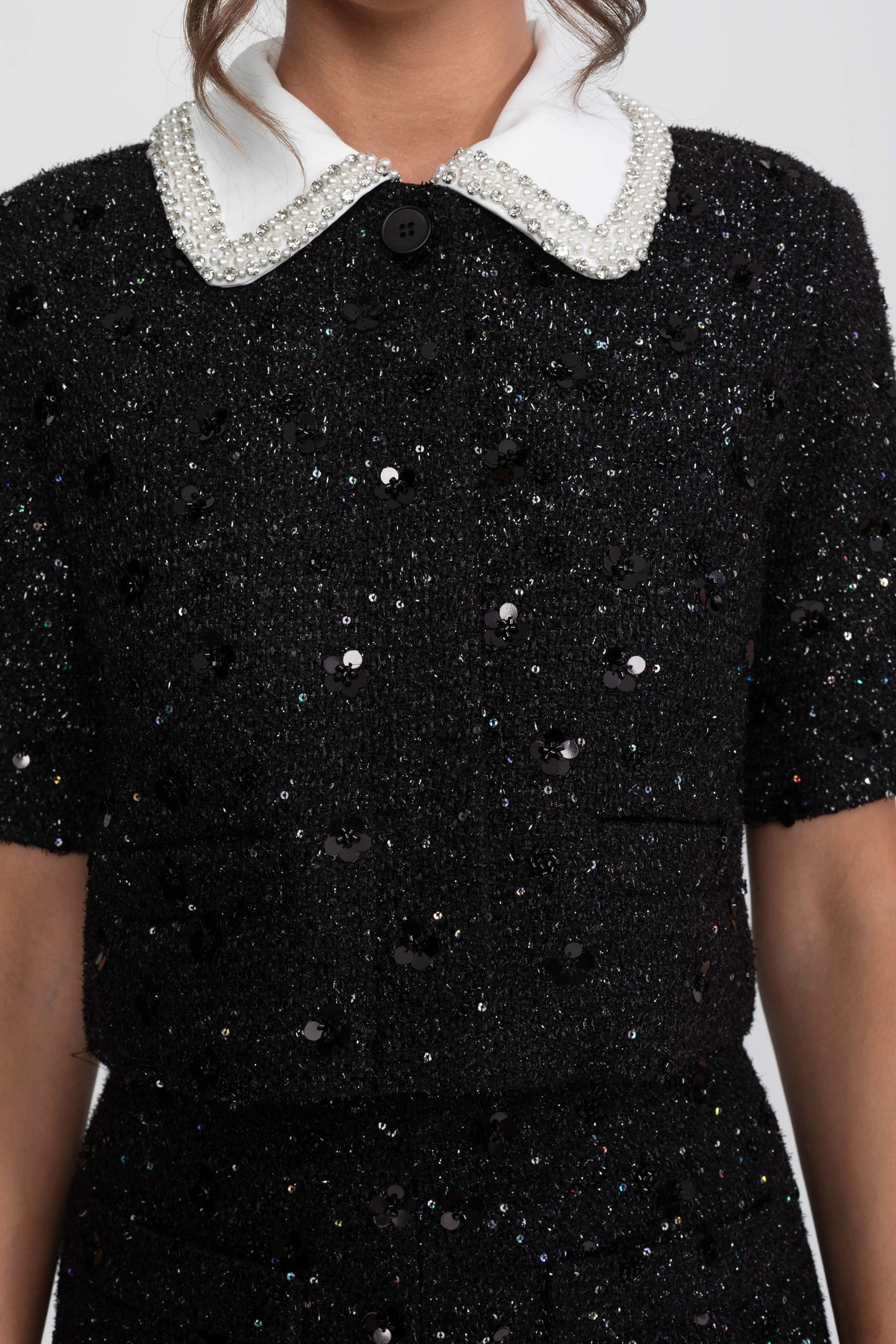 Giacca cropped in tweed a maniche corte con colletto a contrasto e dettaglio di paillettes - Nero 
