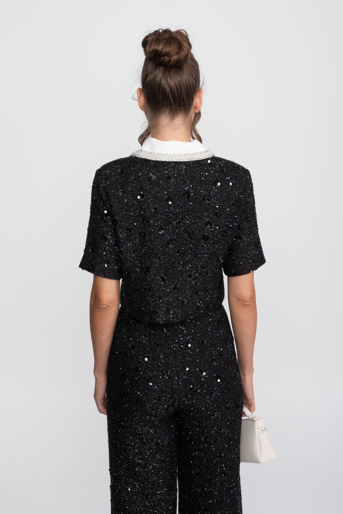 Giacca cropped in tweed a maniche corte con colletto a contrasto e dettaglio di paillettes - Nero 