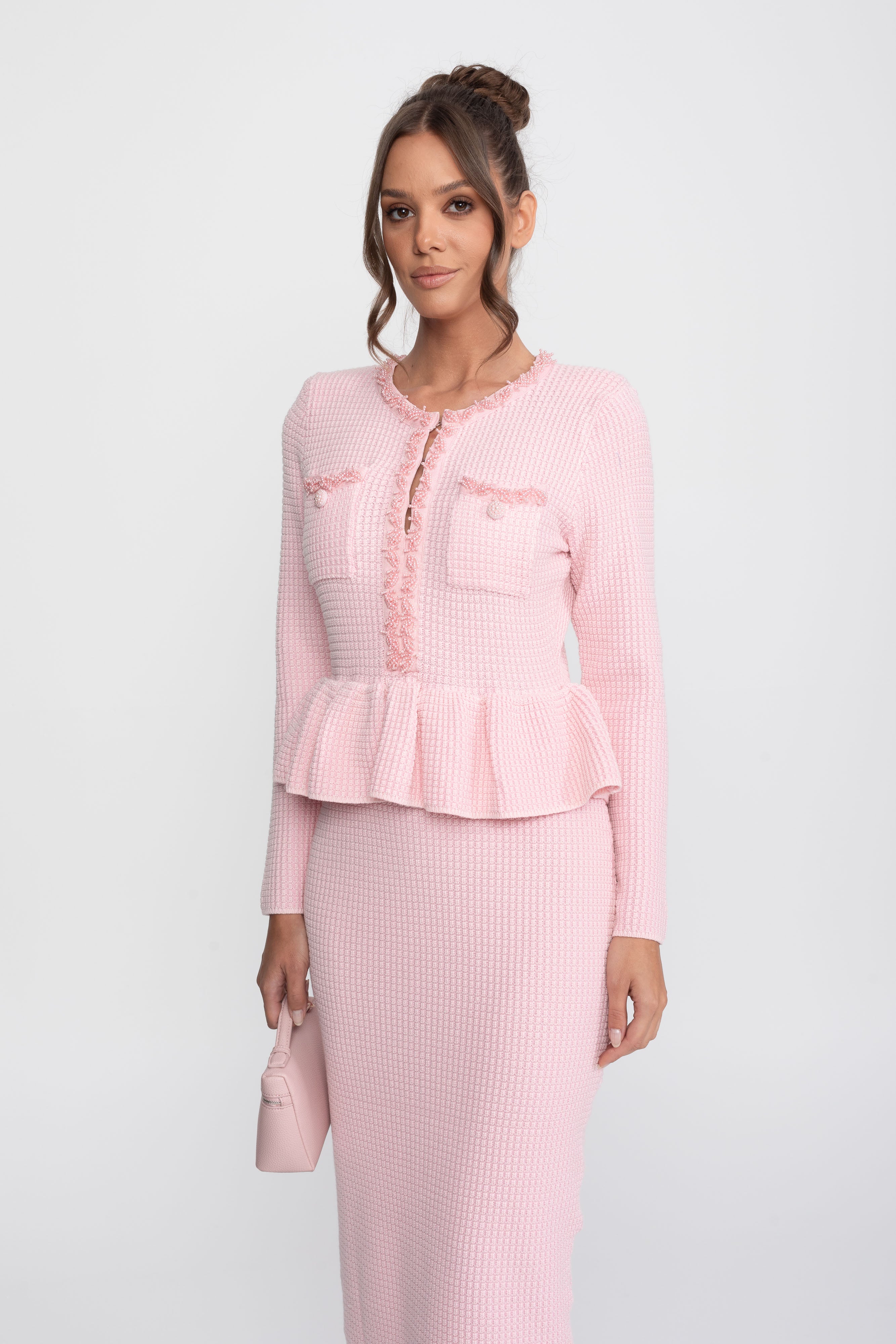 Abito Peplum in Maglia con Rifiniture Frangiate e Tasche Frontali sul Petto - Rosa 